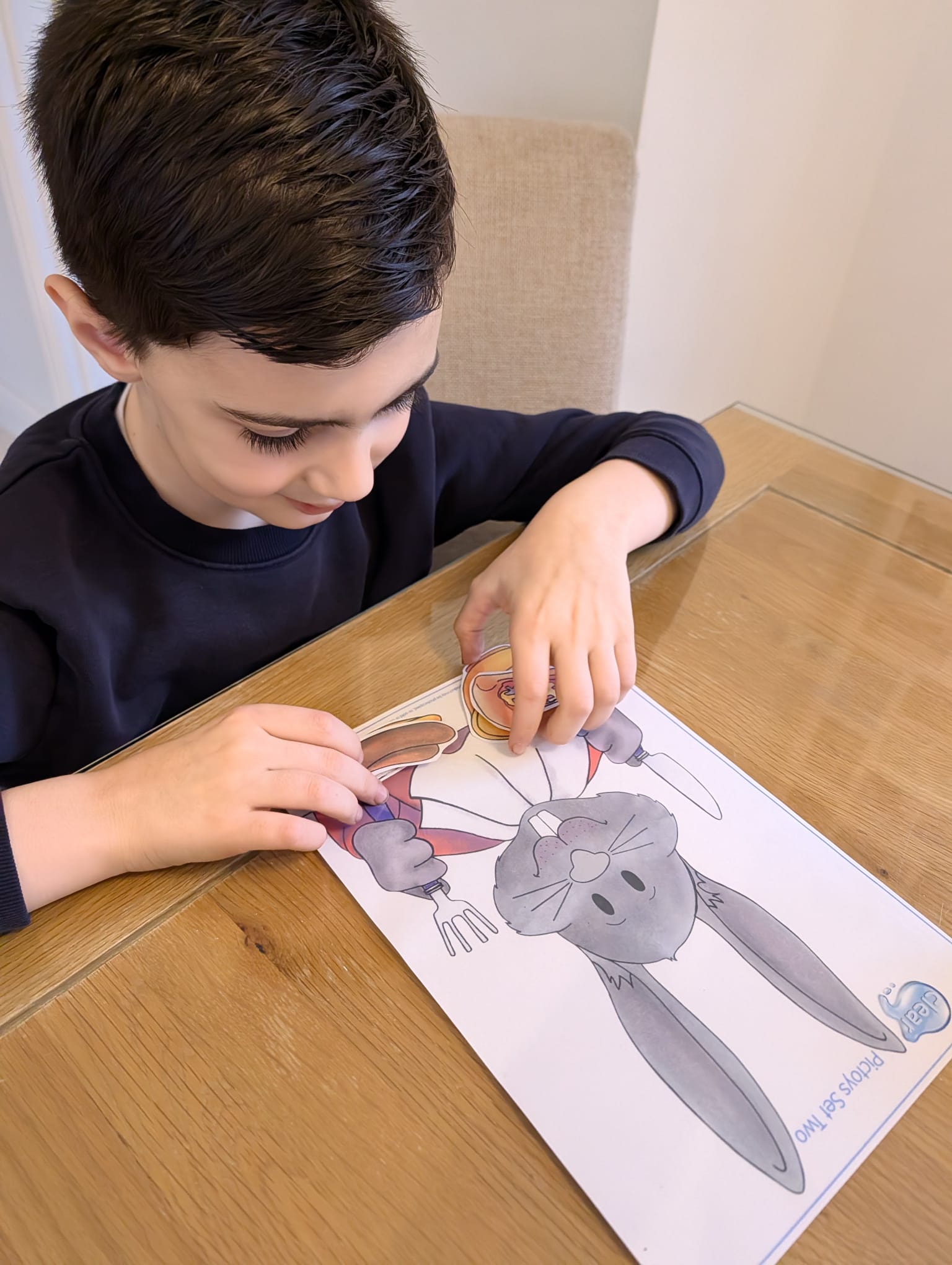 Child engaged in speech therapy activity